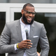 LeBron James addresses the crowd during the opening ceremonies of the I Promise School on July 30, 2018 in Akron, Ohio.